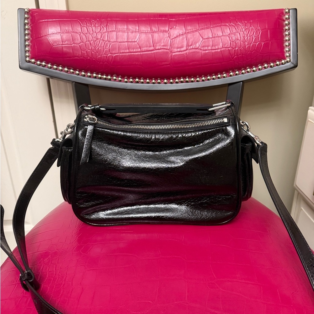 Marc Jacob’s patent leather pocket book